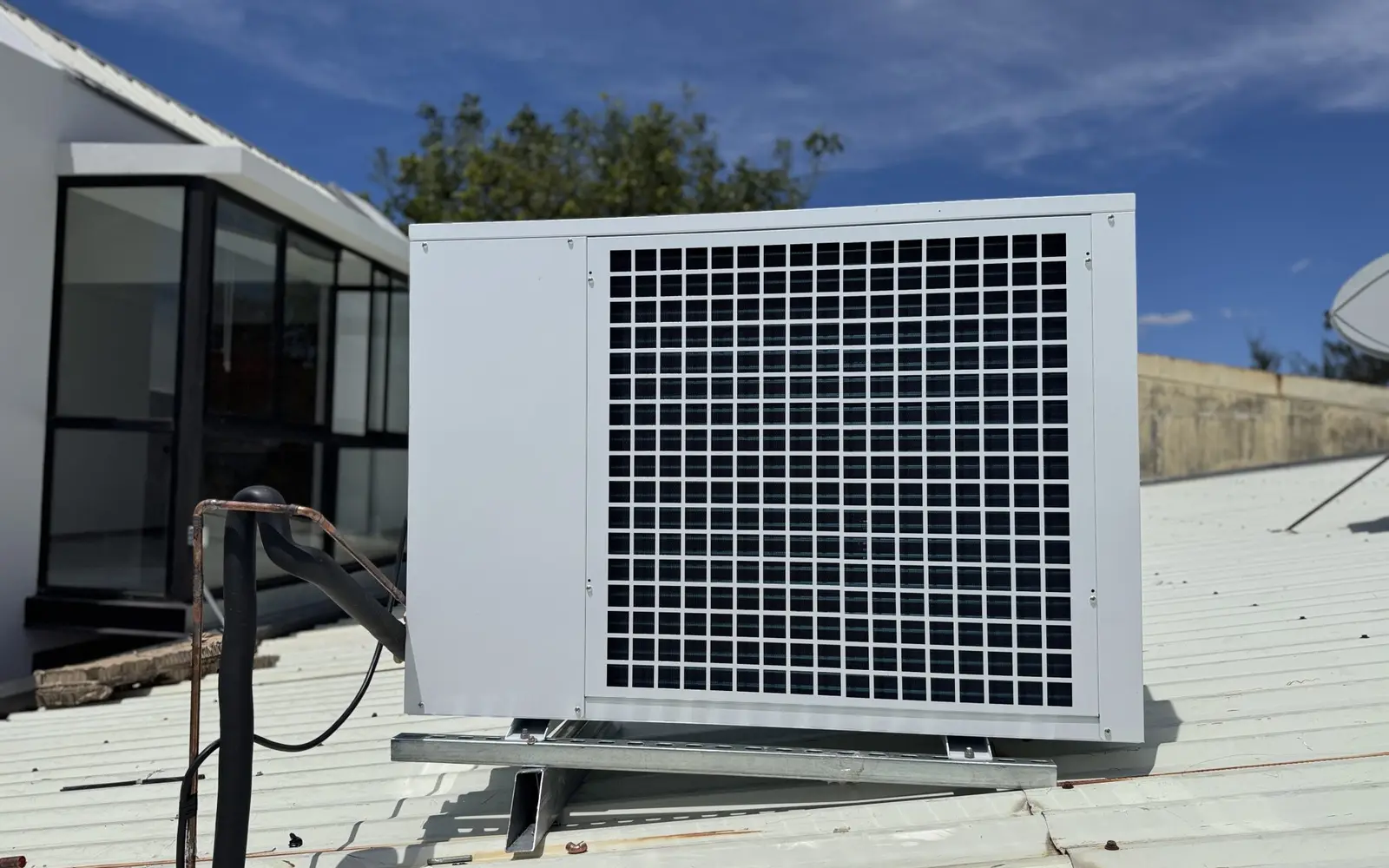 An air conditioning unit on a rooftop